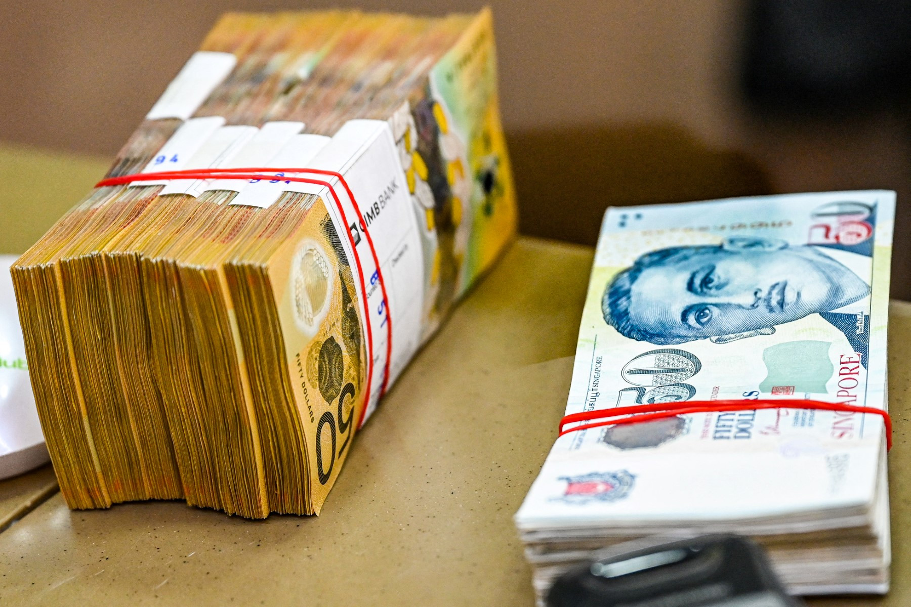 DPR Dorong Kepolisian Profesional dalam Penanganan Kasus Uang Dolar Singapura Palsu