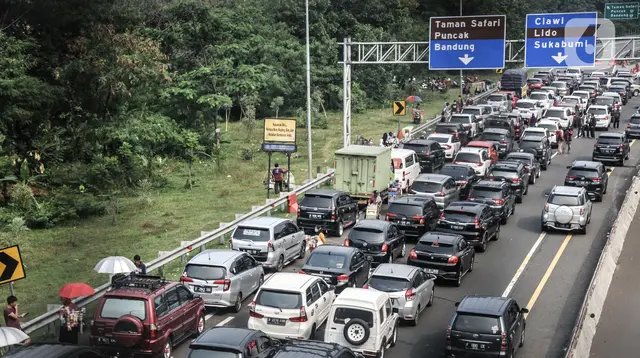 ---
Penerapan Sistem Satu Arah di Puncak Menuju Jakarta

---